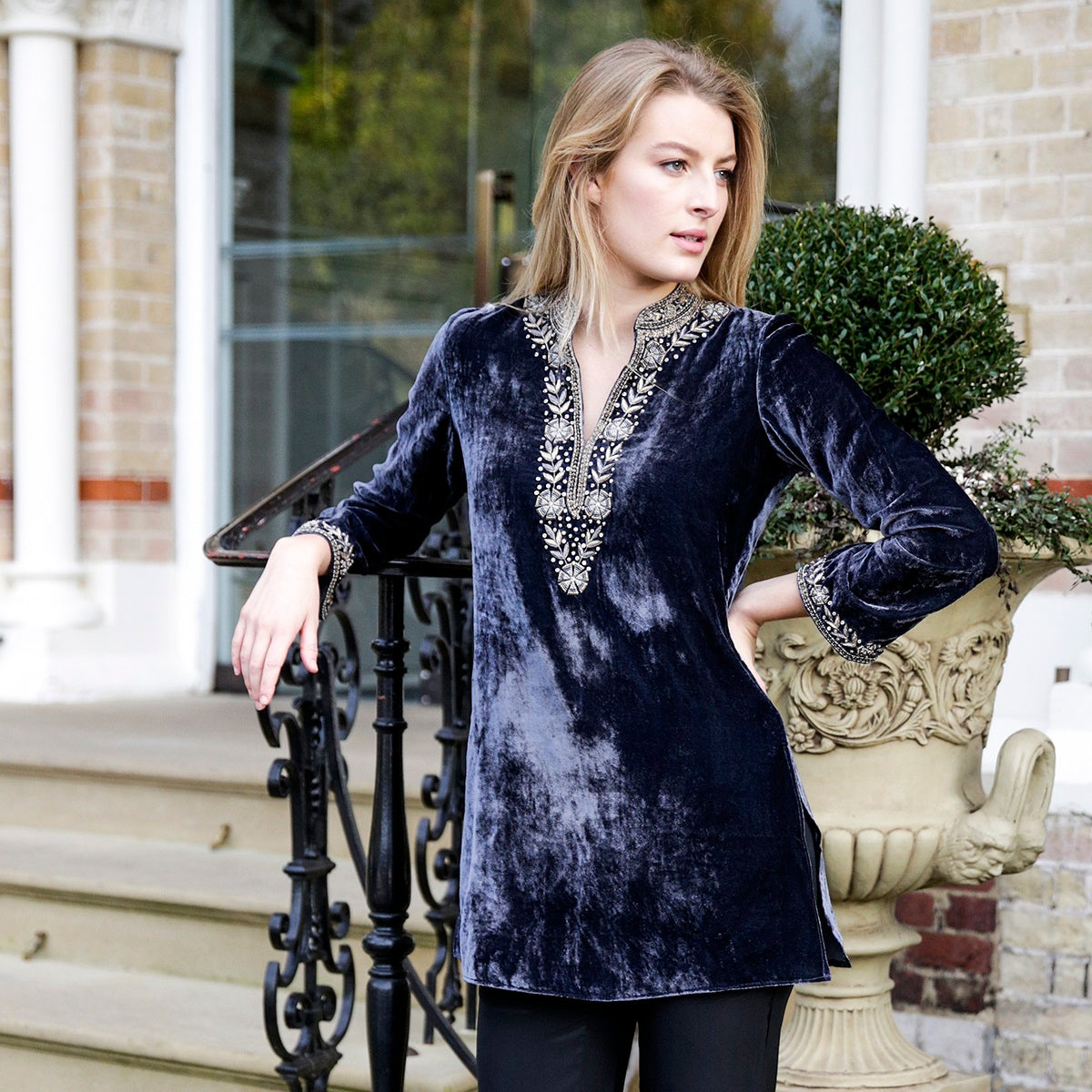 Close-up of dark grey velvet Samode tunic by Kaminee London