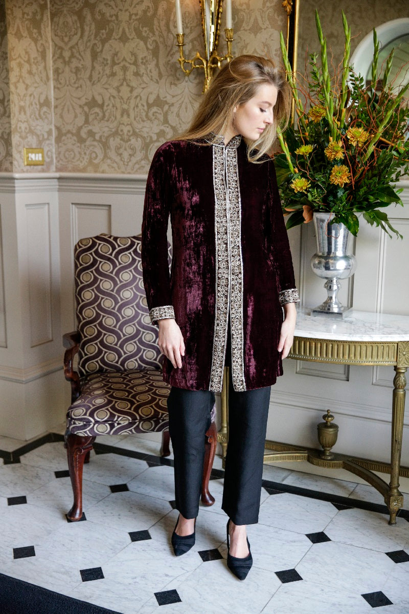 Deep burgundy embroidered velvet jacket with a structured heritage silhouette by Kaminee