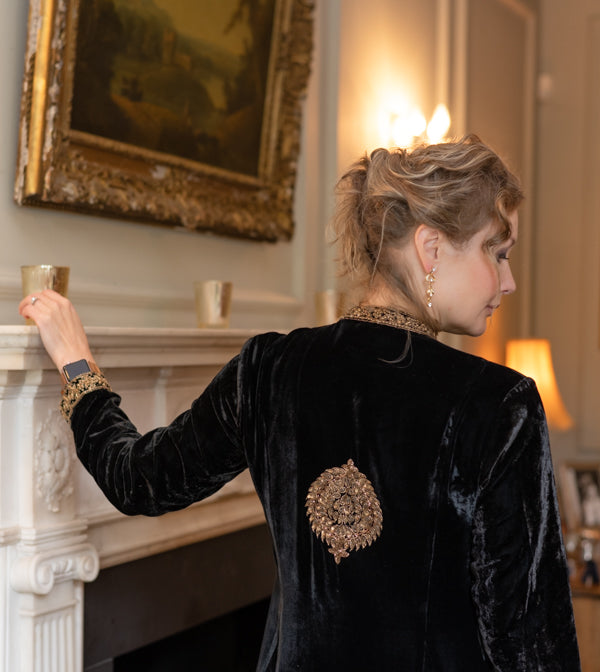 Black embroidered velvet jacket showing fabric detail and drape by Kaminee