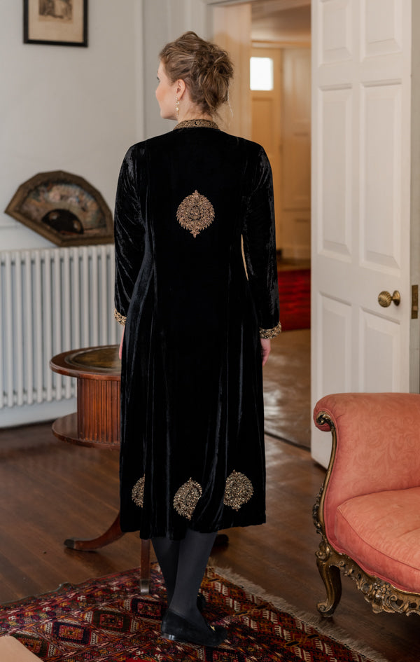 Detail view of black embroidered velvet swing jacket by Kaminee