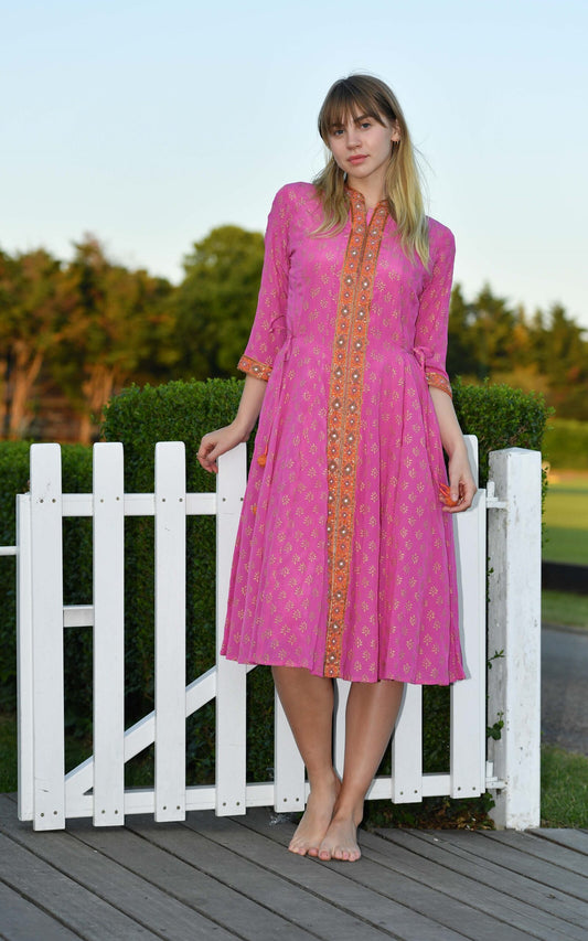 Fuchsia silk angharkha dress with a full front opening by Kaminee