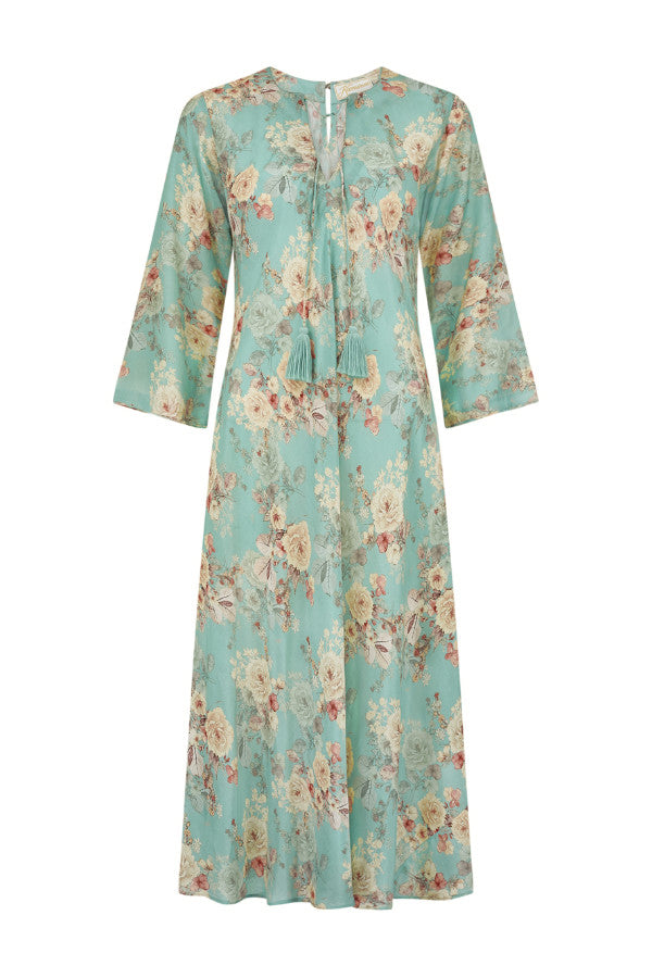 Detail view of aqua cotton silk dress fabric and relaxed drape by Kaminee