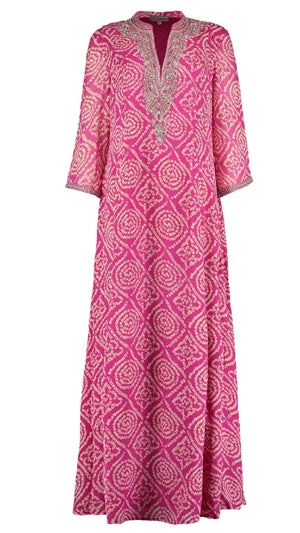 Long pink silk dress with a soft flowing resortwear silhouette by Kaminee